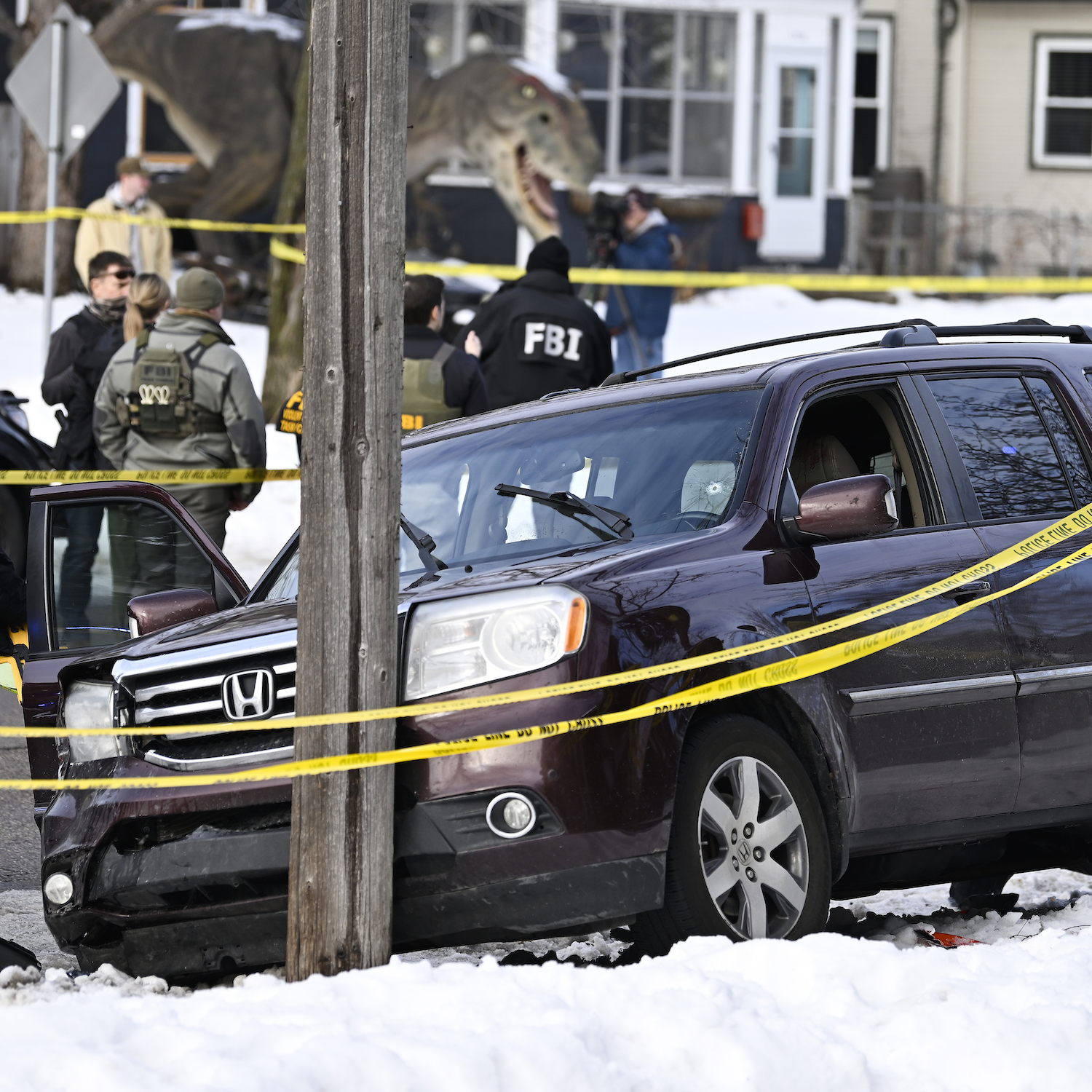 A woman is shot and killed by an ICE agent. What to know.