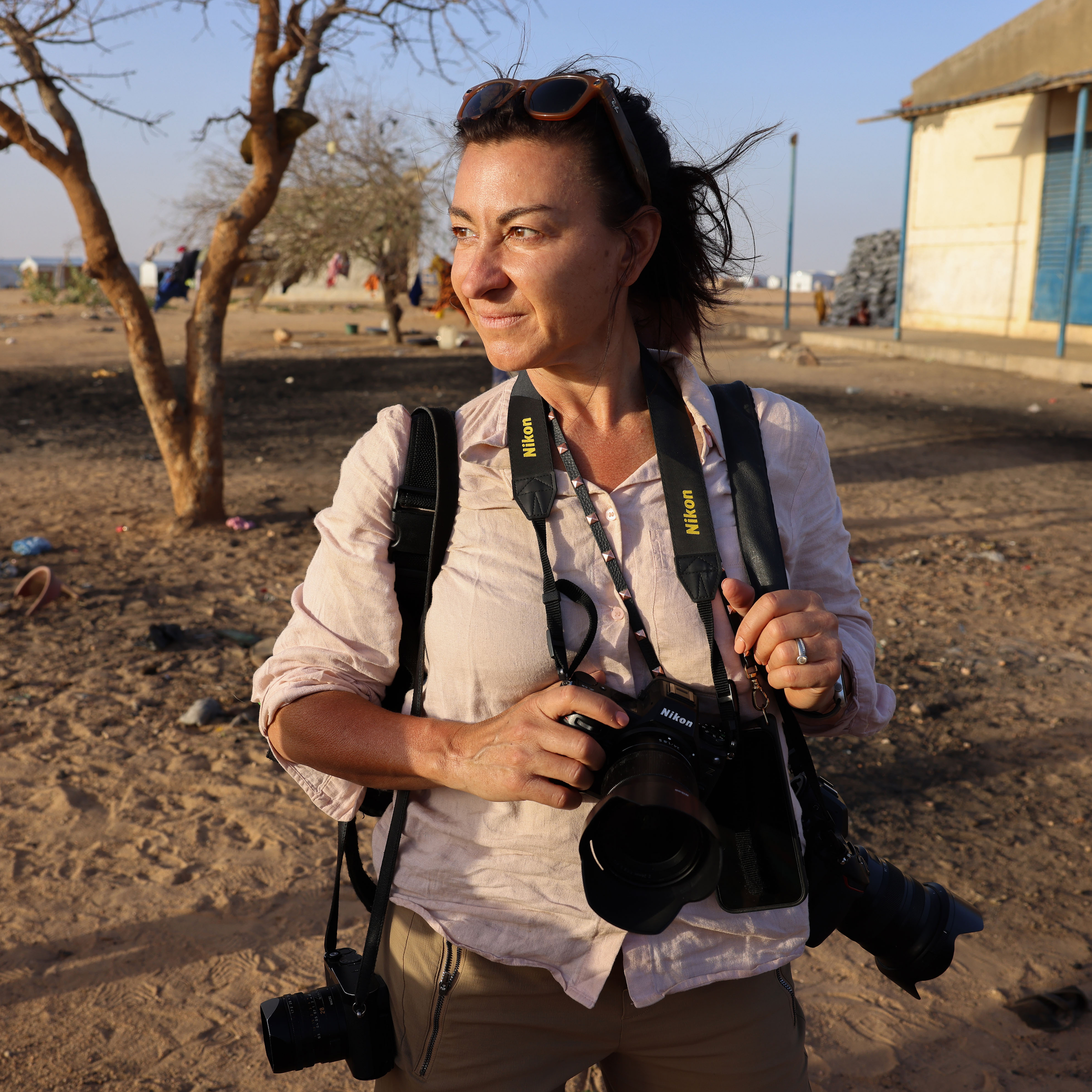 She documents war’s darkest truths — then returns home to her family